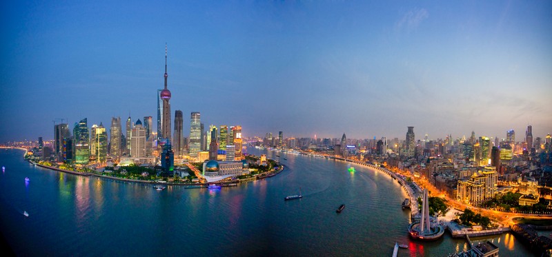 China Shanghai town city blocks of flats high-rise buildings city skyline Huangpu river flow Pudong evening travel traveling