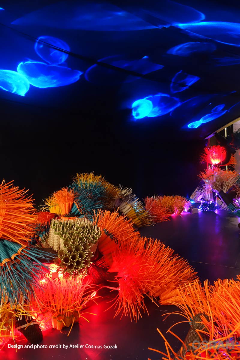 The installation and the virtual jellyfish project on the ceiling to create a underwater sea life environment